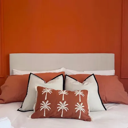 Апартаменты Palm Haven 5 Min From Lido Centro Лидо-ди-Остия
